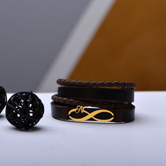 دستبند طلا چرم طرح بینهایت و حرف N